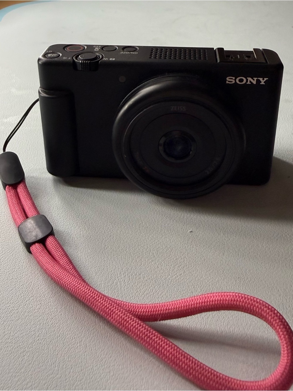 Sony Black Compact Digital Camera with Pink Wrist Strap